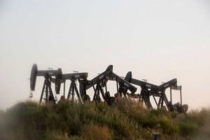The U.S. benchmark for oil slid 5.8 percent Monday to settle down $2.32 at $37.65 a barrel, with analysts warning prices may drop into the low $30s or even $20s. That almost guarantees continued job cuts. Photo: Carolyn Van Houten /San Antonio Express-News / San Antonio Express-News
